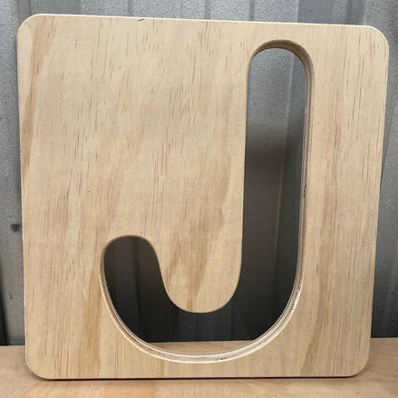 Large single letter plywood sign